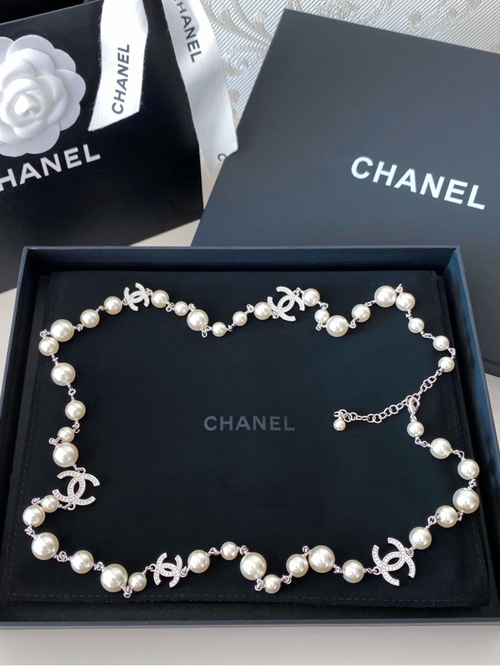 CHANEL Pearl Station Necklace with Silver CC Logos - White Pearls